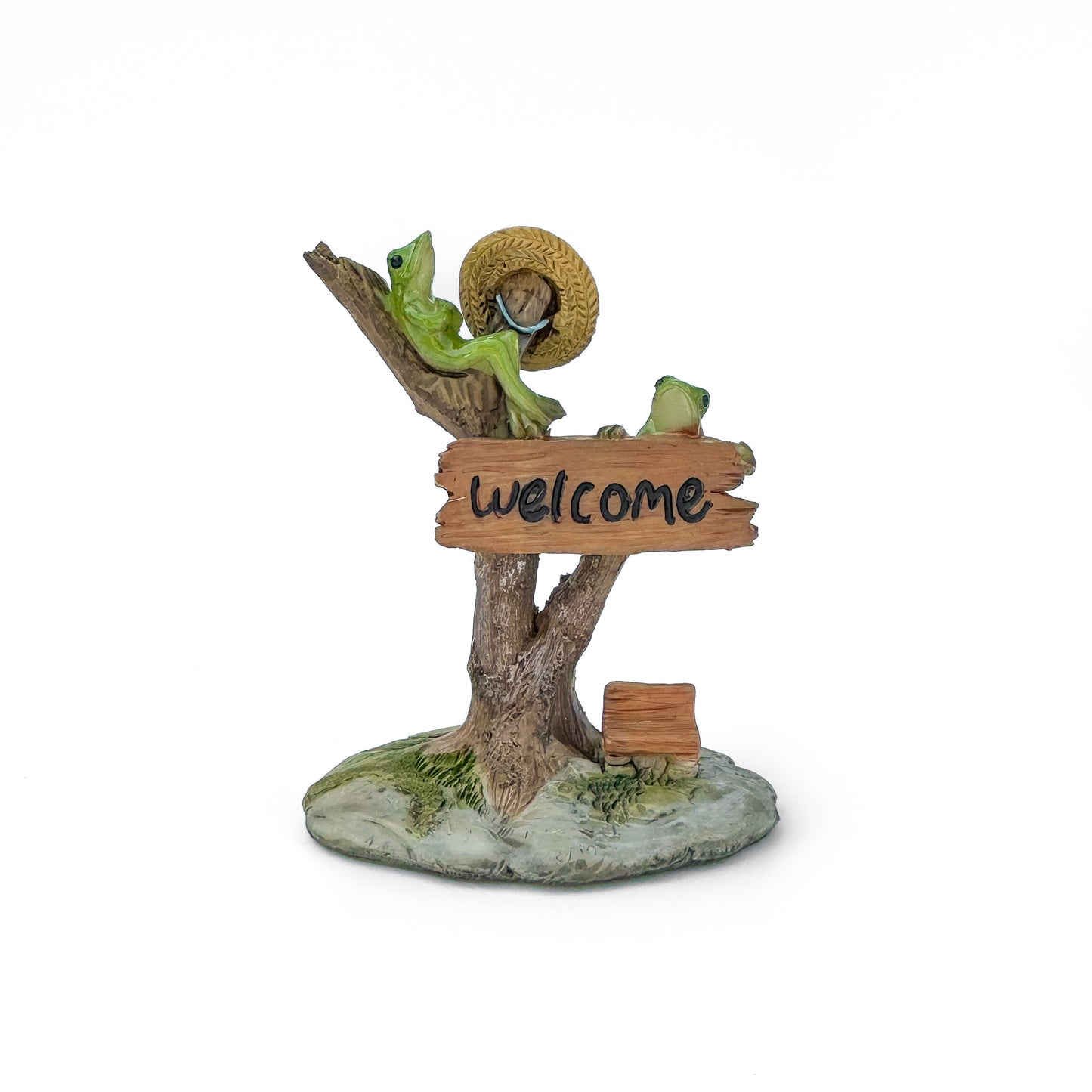 Frogs Relaxing on Welcome Sign