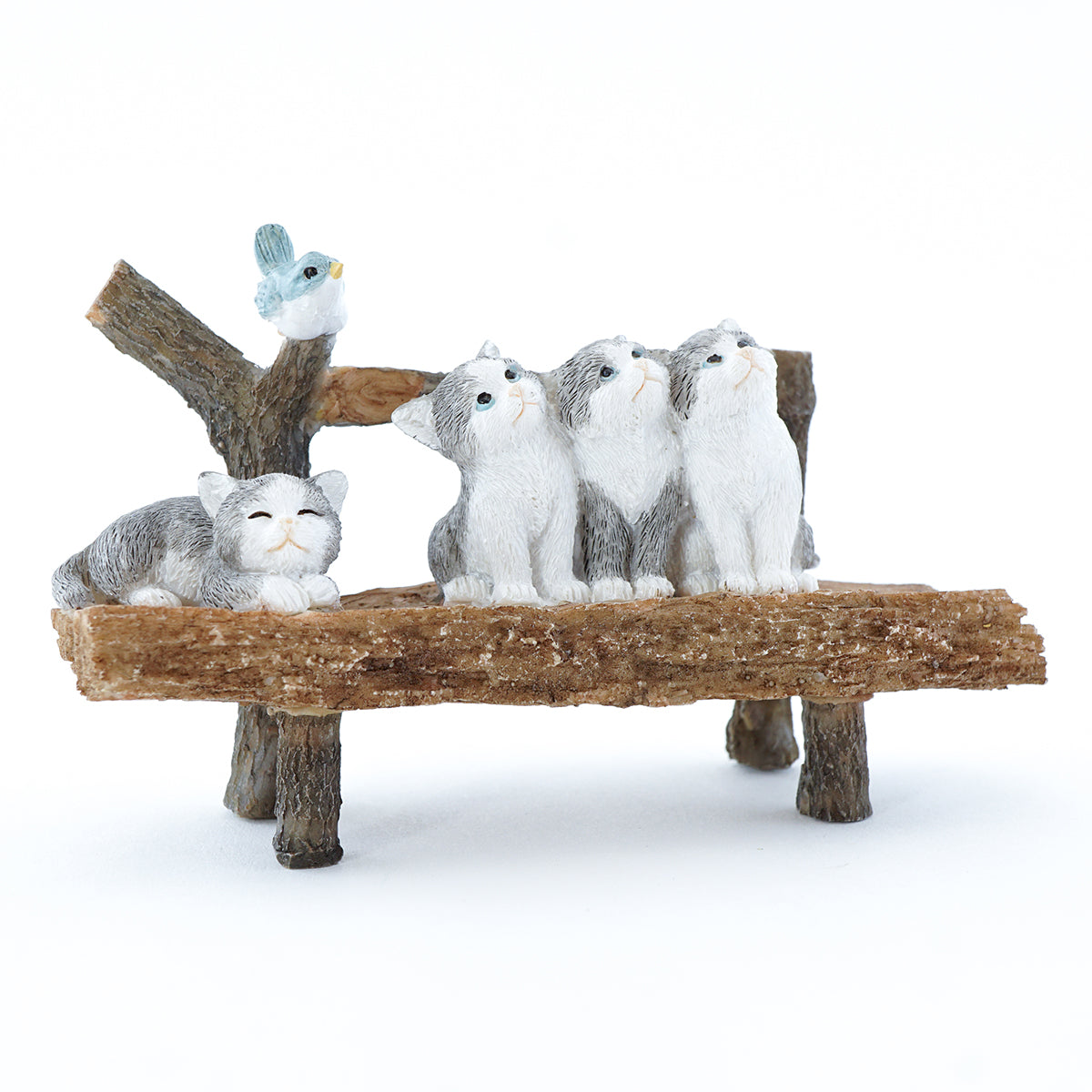Curious Kittens on a Bench