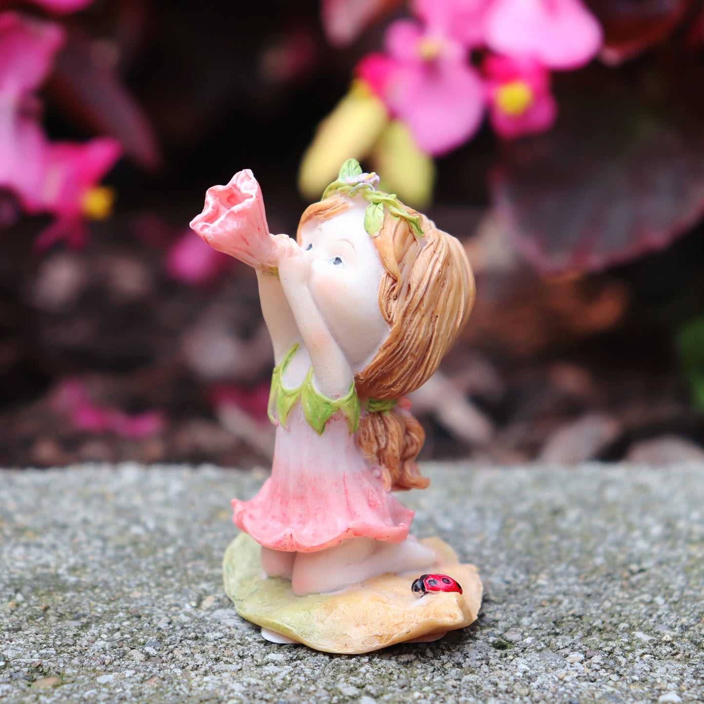 Little Fairy Blowing Flower
