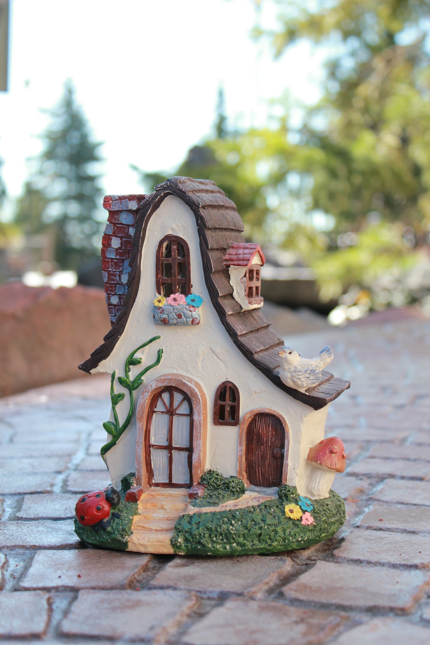 Whimsical Fairy House with Ladybug